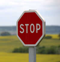 Close up of stop sign in rural area